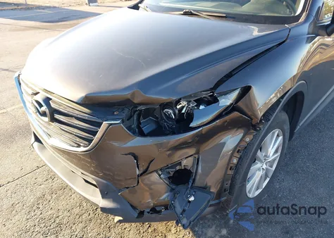 2016 Mazda Cx-5 Sport z USA, uszkodzony, nr VIN JM3KE4BY0G0670864